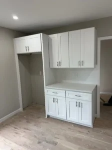 White shaker cabinets with additional storage installed for a modern, spacious kitchen.