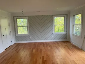 Bedroom accent wall with angled panel design in Full-Home Finish