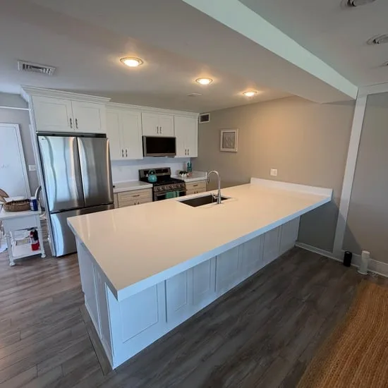 The finished custom island and pristine workspaces from our latest kitchen remodel Fairfield, built to enhance the home's long-term value.
